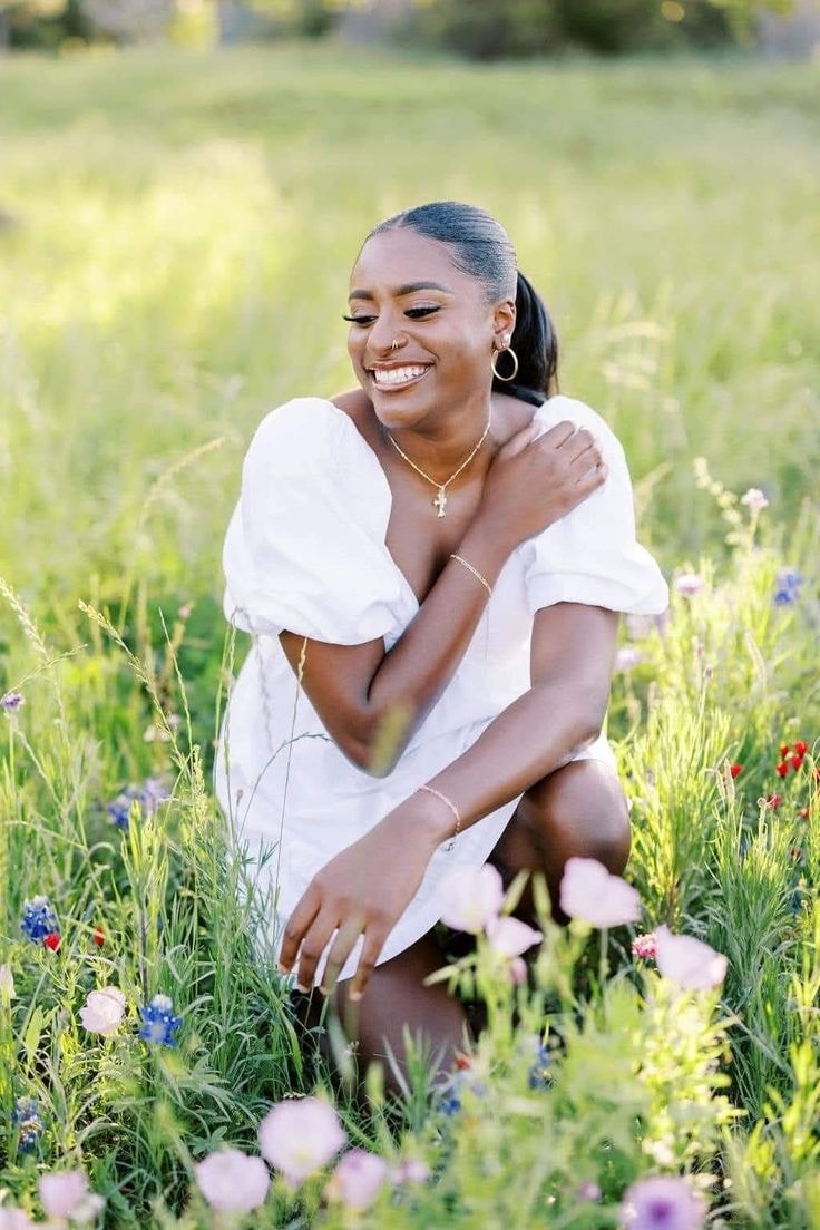 Krissy — white dress, wildflower field, crouching, golden hour